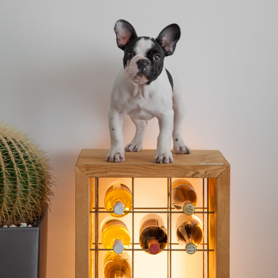 Portabottiglie in legno massello illuminato